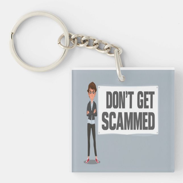 Don't Get Scammed Banner Next To A Scammer Keychain (Front)