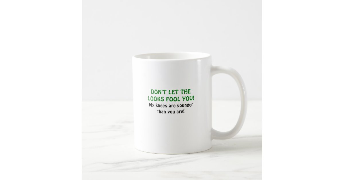 https://rlv.zcache.com/dont_let_the_looks_fool_you_my_knees_are_younger_coffee_mug-r24171ba60b294dabad9e09128a1ba81b_x7jgr_8byvr_630.jpg?view_padding=%5B285%2C0%2C285%2C0%5D