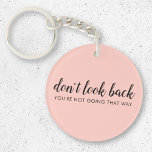 Don't Look Back | Modern Uplifting Peachy Pink Keychain<br><div class="desc">Simple, stylish “Don’t look back you’re not going that way” custom design with modern script typography on a blush pink background in a minimalist design style inspired by positivity and looking forward. The text can easily be customized to add your own name or custom slogan for the perfect uplifting gift!...</div>
