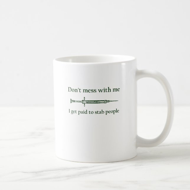 Don't mess with me I get paid to stab people Coffee Mug (Right)