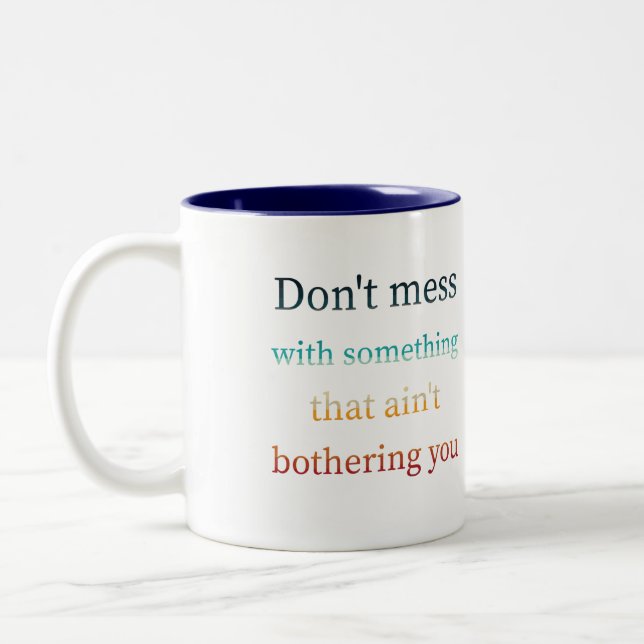 Don't mess with something that ain't bothering you Two-Tone coffee mug (Left)