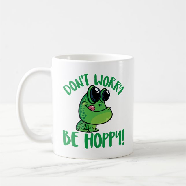 Don't Worry Be Hoppy Smiling Cartoon Frog Coffee Mug (Left)