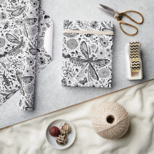 Doodle bugs on dark blue wrapping paper