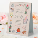 Doodle Christmas Bridal Shower Food Drinks sign<br><div class="desc">Celebrate the upcoming Bridal Shower of your favorite bride-to-be in style with our quirky and whimsical winter themed bridal shower invitations! This invitation features a hand-drawn illustration of a Christmas dinner scene in a fun and playful style, accompanied by a casual, handwritten font that perfectly captures the excitement and joy...</div>