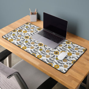Doodle flowers and leaves in yellow and black desk mat