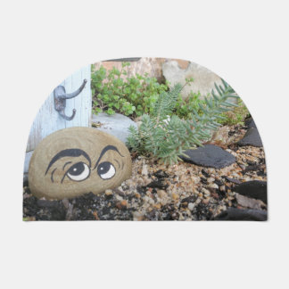 Doormat fun rock garden face