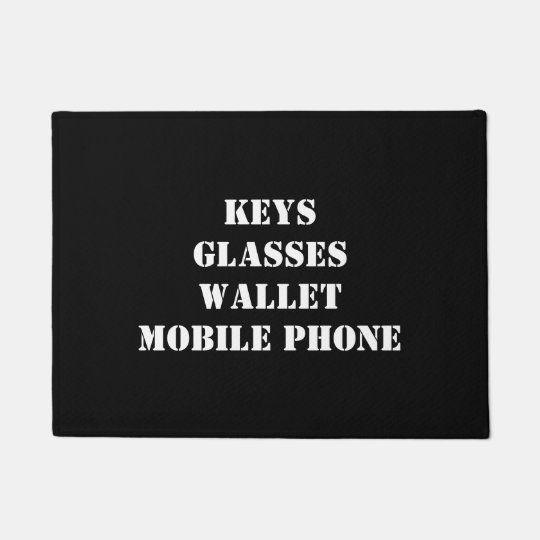 Doormat with keys, glasses, mobile phone, wallet