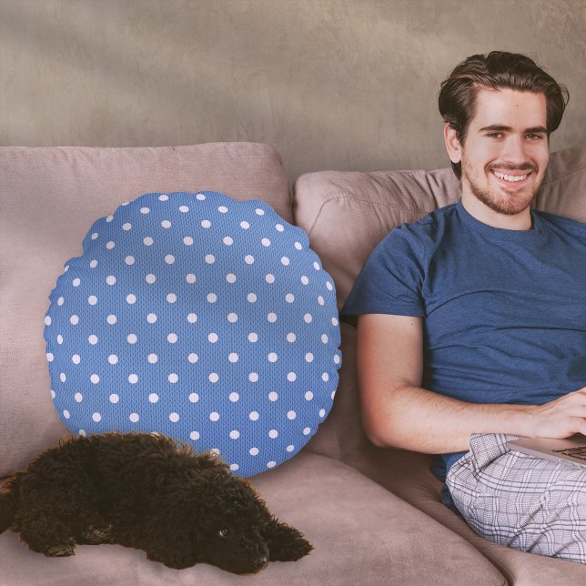 Dotty Delight Blue Round Pillow (A Dotty Delight Blue Round Pillow on the sofa.)