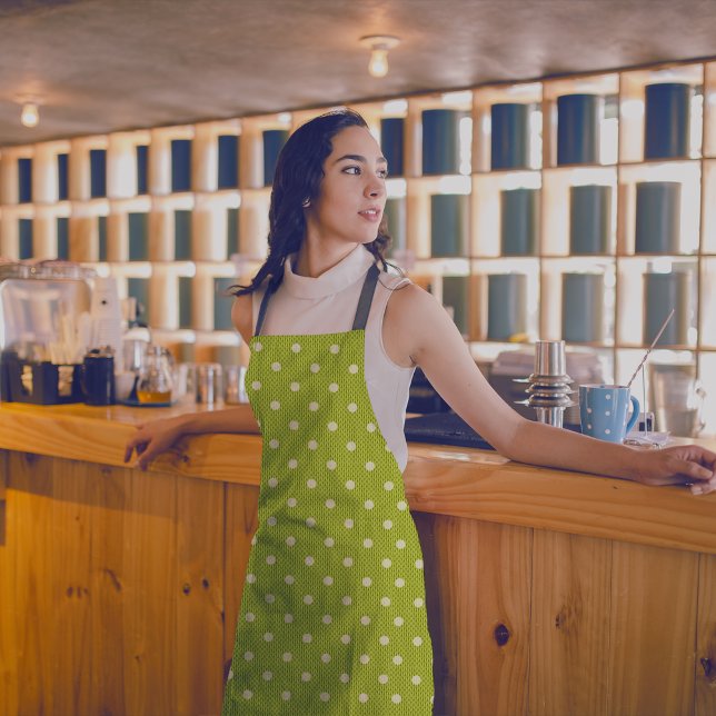 Dotty Delight Green Apron (A woman in a Dotty Delight Green apron is standing in the bar. )