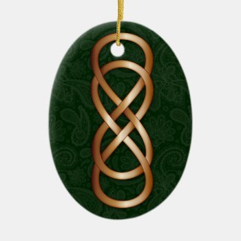 Double Infinity In Bronze On Deep Green Paisley 2 Ceramic Ornament by LilithDeAnu at Zazzle
