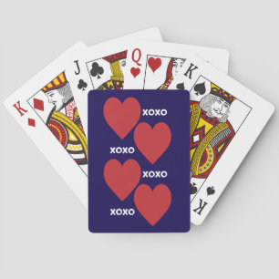 Double red heart and xoxo pattern on blue poker cards