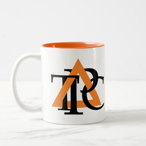 Double_sided Triangle logo mug orange inside Two_Tone Coffee Mug
