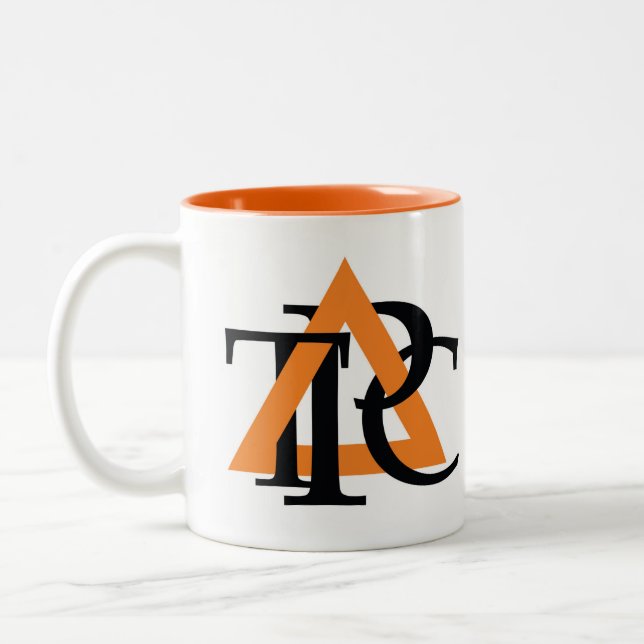 Double-sided Triangle logo mug, orange inside Two-Tone Coffee Mug (Left)