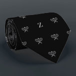 Double Tennis Rackets Ball Monogram Initial Black Neck Tie<br><div class="desc">Serve up a stylish ace with our Double Tennis Rackets and Ball Skinny Tie – the perfect accessory for the tennis aficionado in your life. This tie isn't just a fashion statement; it's a visual celebration of the love for this dynamic sport, making it an ideal gift for tennis fans,...</div>