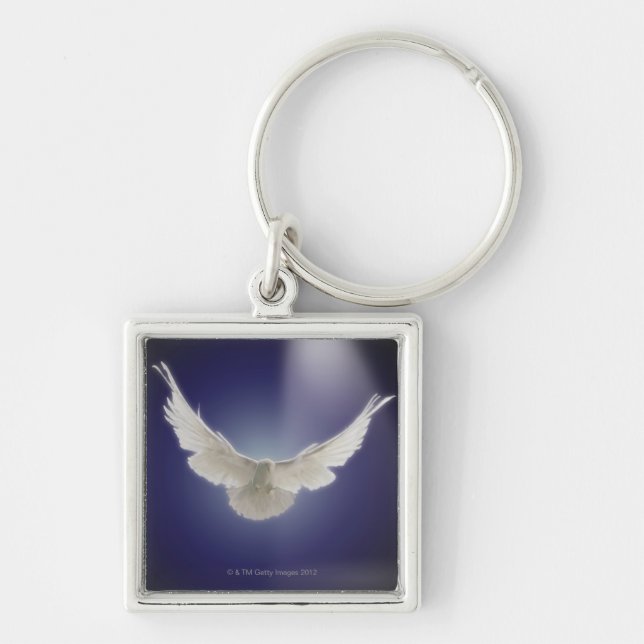 Dove flying through beam of light keychain (Front)