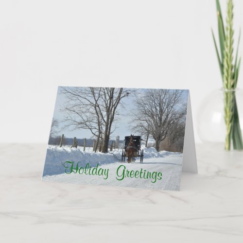 Down a snowy country lane on Christmas Holiday Card