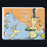 Dr. Seuss Green Eggs & Ham Water Scene Wooden Box Sign<br><div class="desc">This officially licensed product features a memorable illustration from the beloved Dr. Seuss book, Green Eggs and Ham. The scene shows Guy-Am-I holding a plate of the famous dish while submerged in the waves, surrounded by Sam-I-Am, a goat, a fox, a mouse, and other classic characters from the story. It...</div>
