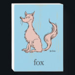 Dr. Seuss | Pink Fox Wooden Box Sign<br><div class="desc">This officially licensed Dr. Seuss design features a classic, minimalist illustration of the whimsical pink fox character. The character is depicted sitting with its eyes closed and a bushy tail, accompanied by the word "fox" and the authentic Dr. Seuss signature. This simple yet recognizable artwork captures the charming, hand-drawn style...</div>