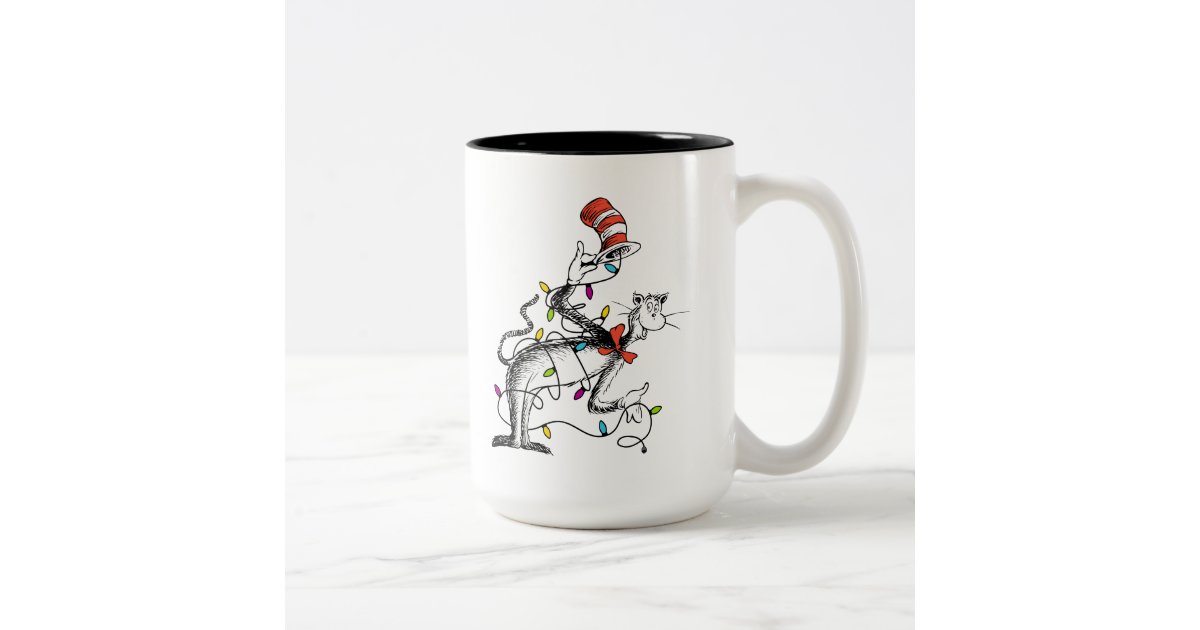 https://rlv.zcache.com/dr_seuss_the_grinch_mischievous_cat_in_the_ha_two_tone_coffee_mug-re81fcde289024efd908502b0dac8f7ea_x7j54_8byvr_630.jpg?view_padding=%5B285%2C0%2C285%2C0%5D