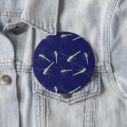 Dragonflies on blue button