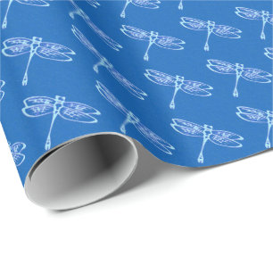 Dragonflies, pale blue on denim blue wrapping paper