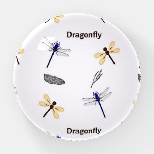 Dragonfly pattern on white paperweight