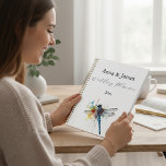 Dragonfly Wedding, custom Planner<br><div class="desc">This wedding planner features a stunning cover adorned with a vibrant, colorful dragonfly, symbolizing transformation, love, and new beginnings. The names of the bride and groom are elegantly displayed in graceful calligraphy, adding a personal and romantic touch. The back cover mirrors the front, with another beautifully detailed dragonfly, creating a...</div>