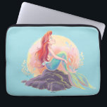 Dreamy Ariel on the Rocks Laptop Sleeve<br><div class="desc">Let your imagination swim free with this stunning illustration of Ariel, the curious mermaid princess, basking in the glow of a dreamy pastel sunset! Perched on her favorite rock with her iconic flowing red hair and shimmering tail, Ariel captures the magic of undersea wonder and the thrill of dreaming big....</div>