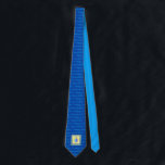 Dreidel, Dreidel, Dreidel! Hanukkah Tie<br><div class="desc">Celebrate the holidays with family and friends wearing this blue and yellow Dreidel,  Dreidel,  Dreidel! Hanukkah Tie. Its contemporary dreidel graphic is set upon a repeat pattern of "Happy Hanukkah." Also makes a great Hanukkah gift.</div>