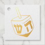 Dreidel  foil favor tags<br><div class="desc">Celebrate eight days and eight nights of the Festival of Lights with Hanukkah cards and gifts. The festival of lights is here. Light the menorah, play with the dreidel and feast on latkes and sufganiyots. Celebrate the spirit of Hanukkah with friends, family and loved ones by wishing them Happy Hanukkah....</div>