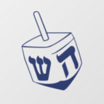 Dreidel Hannukah  Window Cling<br><div class="desc">Celebrate eight days and eight nights of the Festival of Lights with Hanukkah cards and gifts. The festival of lights is here. Light the menorah, play with the dreidel and feast on latkes and sufganiyots. Celebrate the spirit of Hanukkah with friends, family and loved ones by wishing them Happy Hanukkah....</div>