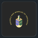 DREIDELS AND MIRACLES OF HANUKKAH SQUARE STICKER<br><div class="desc">This stylized illustration features a dreidel colored yellow, purple, and green against a stark black background. A curved gold text above it reads "DREIDELS AND MIRACLES OF HANUKKAH", highlighting the traditional toy and the spiritual celebration of the Jewish holiday. The design has a clean, geometric aesthetic with a touch of...</div>