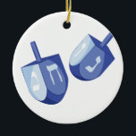 Dreidels Ceramic Ornament<br><div class="desc">The design is beautiful and bright and fills you to the brim with holiday spirit and is perfect on gifts, table runners, kitchen linens, home decor and on all things Hanukkah!</div>