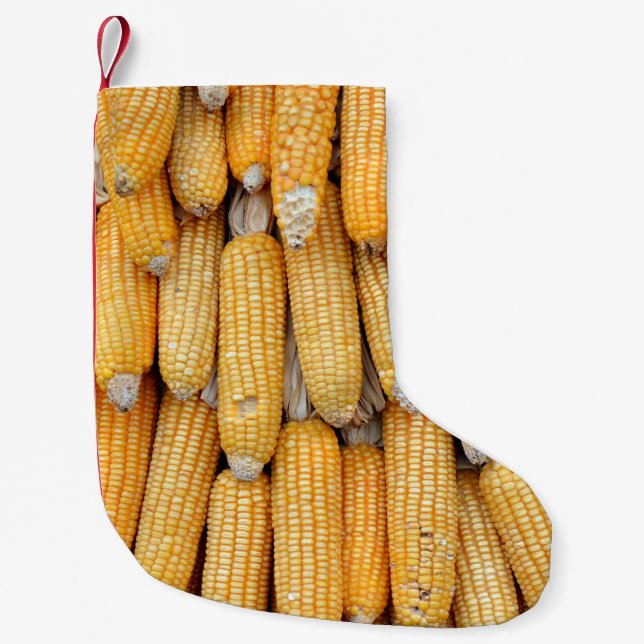 Dried corn that was stacked . small christmas stocking (Front)