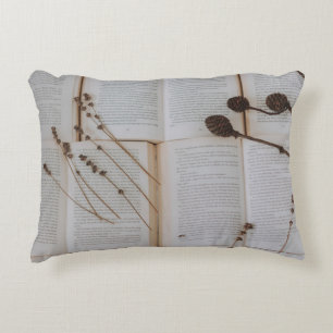 Dried flowers on books accent pillow