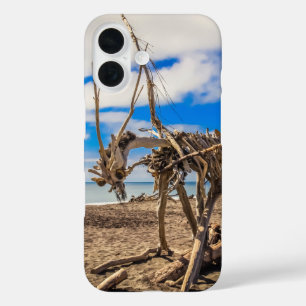 Driftwood artwork on Hokitika Beach, New Zealand iPhone 16 Case