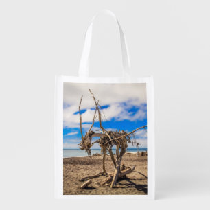 Driftwood artwork on Hokitika Beach, New Zealand Grocery Bag