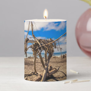 Driftwood artwork on Hokitika Beach, New Zealand Pillar Candle