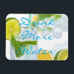 Drink More Water Magnet<br><div class="desc">Remind yourself to stay hydrated with this elegant design.
A beautiful light photo of mineral water in a glass with ice, lemon, lime and mint.</div>