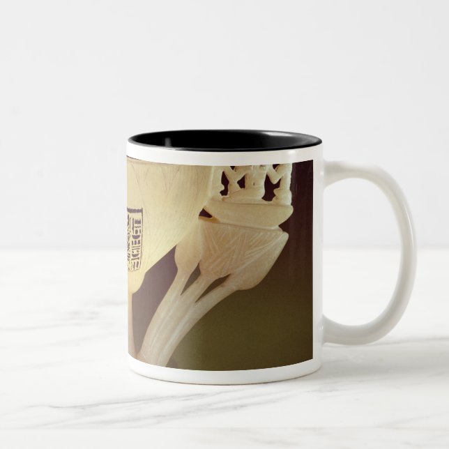 Drinking cup in the form of a half-opened (Right)