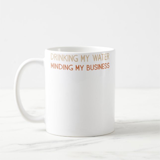 Drinking My Water Minding My Business Coffee Mug (Left)