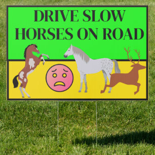 DRIVE SLOW HORSES ON ROAD SIGN