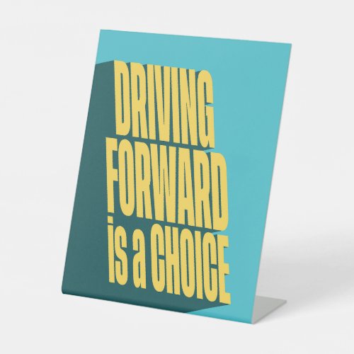 Driving forward is a choice pedestal sign