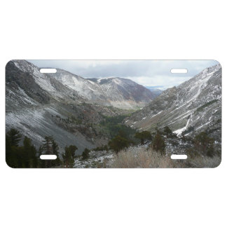 Driving Through the Snowy Sierra Nevada Mountains License Plate