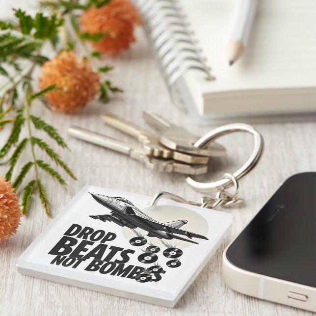 Drop Beats Not Bombs Fighter Jet Vinyl Keychain (Front Right)