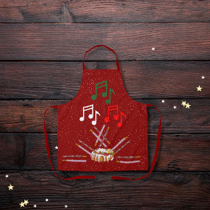 Drum cake, cookie batons, and musical notes red apron