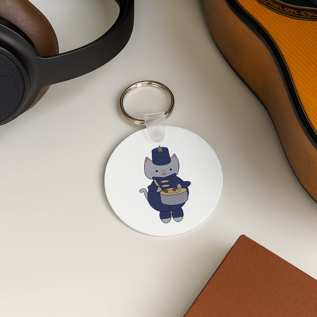 Drummer Cat Marching Band Navy Blue Gold Keychain (A keychain with a snare drum playing cat in a navy blue and gold marching band uniform.)