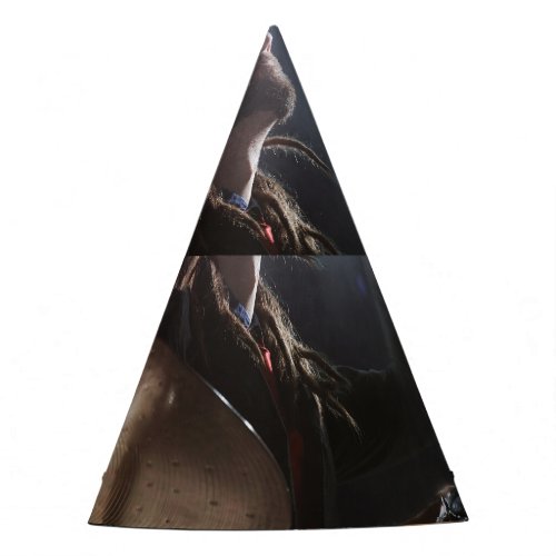Drummer silhouette dark stage setting party hat