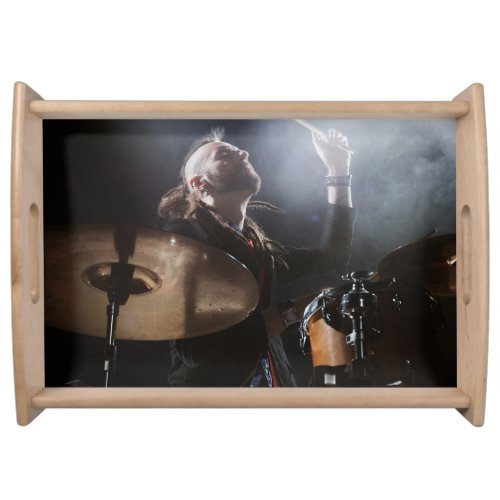 Drummer silhouette dark stage setting serving tray