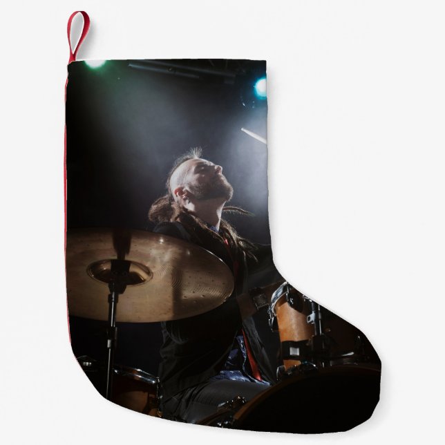 Drummer silhouette, dark stage setting small christmas stocking (Front)